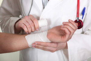 Personal Injury Lawyer Scottsdale, AZ - wrist bandaged by doctor